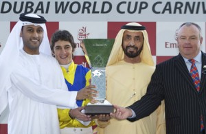Winning owner Sheikh Mohammed bin Khalifa Al Maktoum, trainer Mike de Kock and jockey Christophe Soumillon accept the trophy for the Al Bastakiya (Photographer: Andrew Watkins)