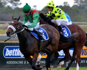 Cut The Cake! Glen Hatt drives Yoshie up to win. Another Idea (Strydom) is in third in the background