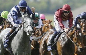 First! Richard Hughes drives the grey Sky Lantern up to win well