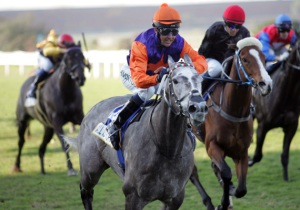 All Smiles. The look on jockey MJ Byleveld's face tells the whole story as All Is Secret powers home