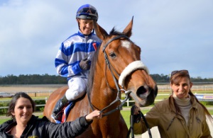 Girl Power! Rain Gal is led in by Miegen Guscott and Estelle Blake (Coastal Photos)