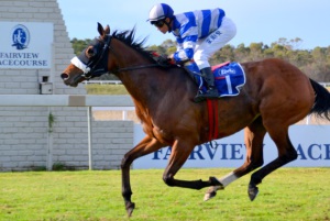 Good Gal! Rain Gal (Richard Fourie) gallops on powerfully to win the Listed Jockey Club Stakes (Coastal Pics)