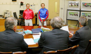 Principal's Office. Dwyer and Steve Drowne in front of the stewards at a recent meeting