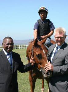 SAJA Headmaster Graham Bailey Dr Blade  Nzimande and Ntokozo Gumede on horse bac
