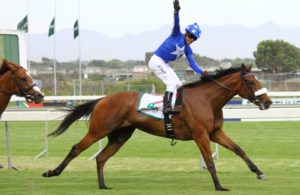 Jet Powered. In The Fast Lane surges clear under a thrilled Richard Fourie to win the Fillies Guineas (Equine Edge)