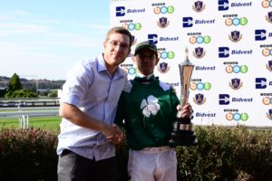 Anthony Delpech receives his trophy from Tyrone Fourie