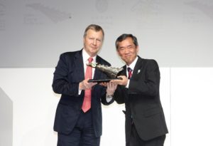 New Chairman Mr Winfried Engelbrecht-Bresges presents a souvenir to thank Dr Koji Sato for his five years as Chairman of the Asian Racing Federation