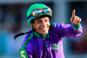 Victor Espinoza celebrates the Kentuck Derby win