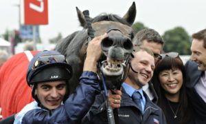 Andrea Atzeni, the winning jockey, with Kingston Hill after the St Leger at Doncaster