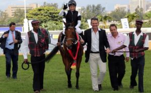 The happy 'A' team - owner's son Lance Sherrell, flanked by assistant Barry Donnelly 