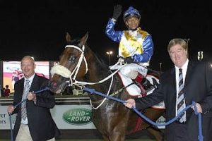 Kapil (Weichong Marwing) won in Dubai with Mike De Kock. He is led in by part-owners James Drew and Mike Fullard. (Andrew Watkins)