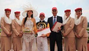 The winning connections (from left, owner Emily Yong, jockey Corey Brown and trainer Patrick Shaw) 