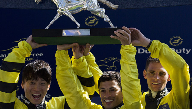 ASCOT, ENGLAND - AUGUST 06: Kenichi Ikezoe (L), Silvestre De Sousa (C) and Gavin Lerena, representing team Rest of The World, after winning The Dubai Duty Free Shergar Cup at Ascot Racecourse on August 6, 2016 in Ascot, England. (Photo by Julian Herbert/Getty Images)