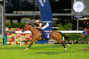 Hugh Bowman on Premiere wins the first leg of the challenge (photo: HKJC)