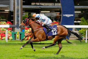 Tight finish for Mirco Demuro on Mutual Joy (photo: HKJC)