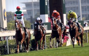 Neorealism with Joao Moreira in the saddle claims the Audemars Piguet QEII Cup (photo: HKJC)