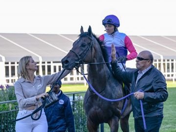 Top racing man Marsh Shirtliff leads in another winner with Candice Bass-Robinson on right and Sean Veale in the saddle (Pic - Chase Liebenberg)