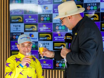 Centurion Sean Veale and Gallop TV’s Warren Lenferna drink a toast to a big moment (Pic - Candiese Lenferna)