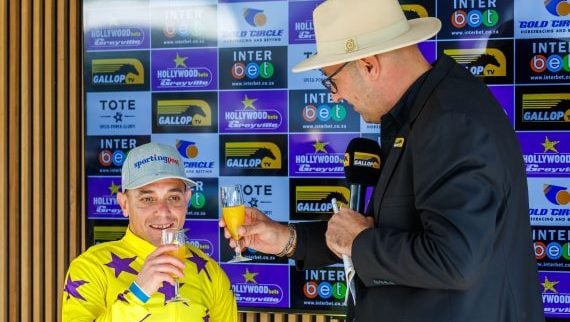 Centurion Sean Veale and Gallop TV’s Warren Lenferna drink a toast to a big moment (Pic - Candiese Lenferna)