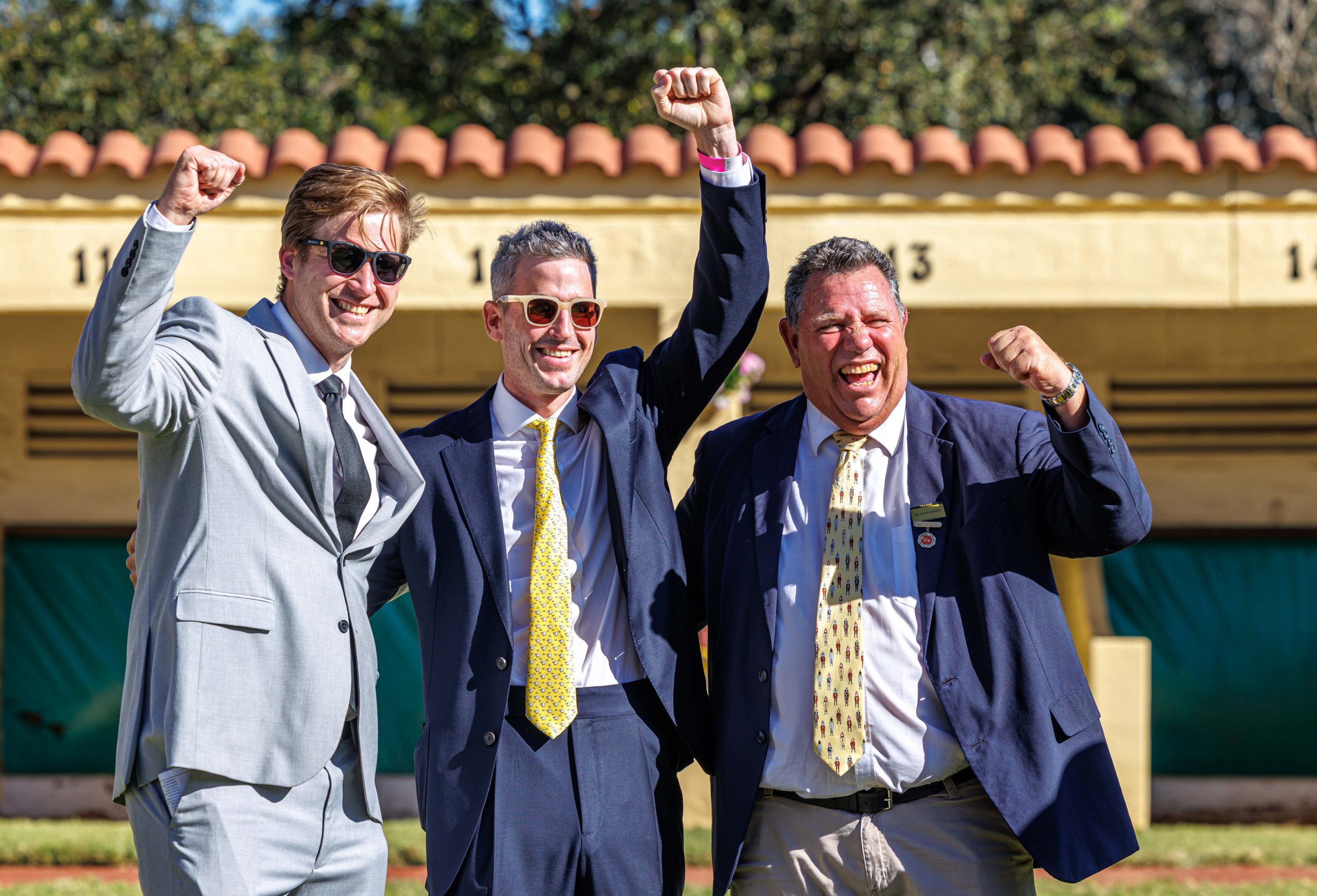 Hollywood Racing's Devin Heffer, Ridgemont's Craig Kieswetter and trainer Alan Greeff celebrate a major moment (Pic - Candiese Lenferna)
