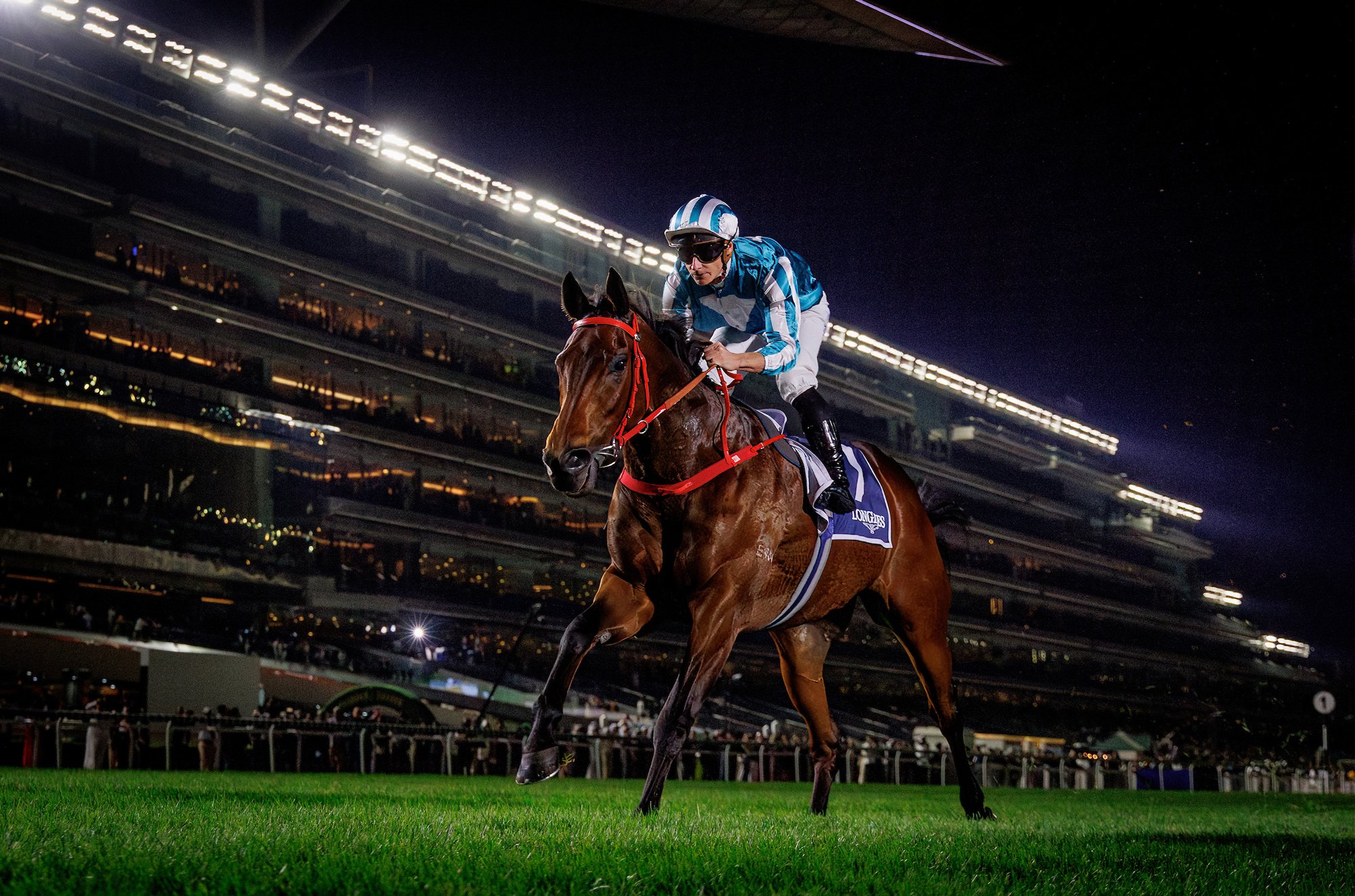 James McDonald steers Romantic Warrior to an impressive victory in the Gr1 Jebel Hatta in Meydan (Pic - HKJC)