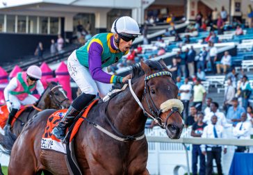 The emotion shows as Serino Moodley and Selukwe cross the line (Pic - Candiese Lenferna)