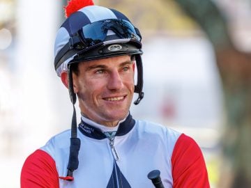 Craig Zackey takes the ride on Dean Kannemeyer's French Flame in the fourth (Pic - Candiese Lenferna)