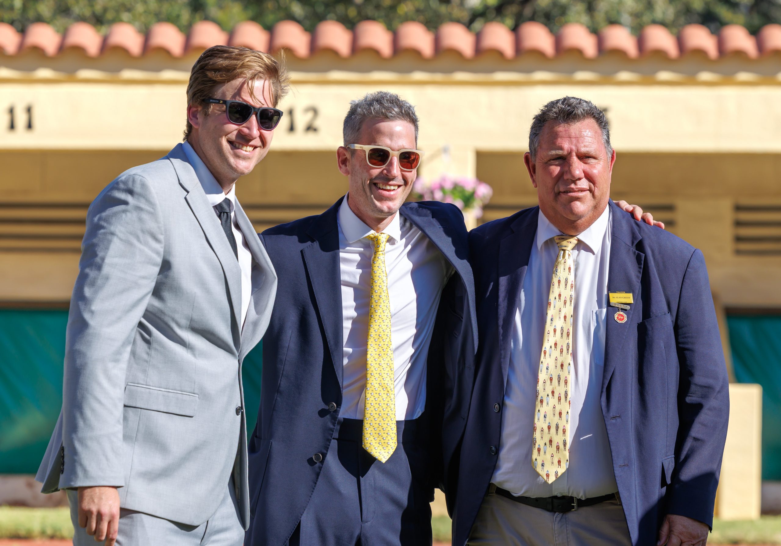 Direct hitters! Devin Heffer and Craig Kieswetter celebrate the Gr1 success with trainer Alan Greeff (Pic - Candiese Lenferna)