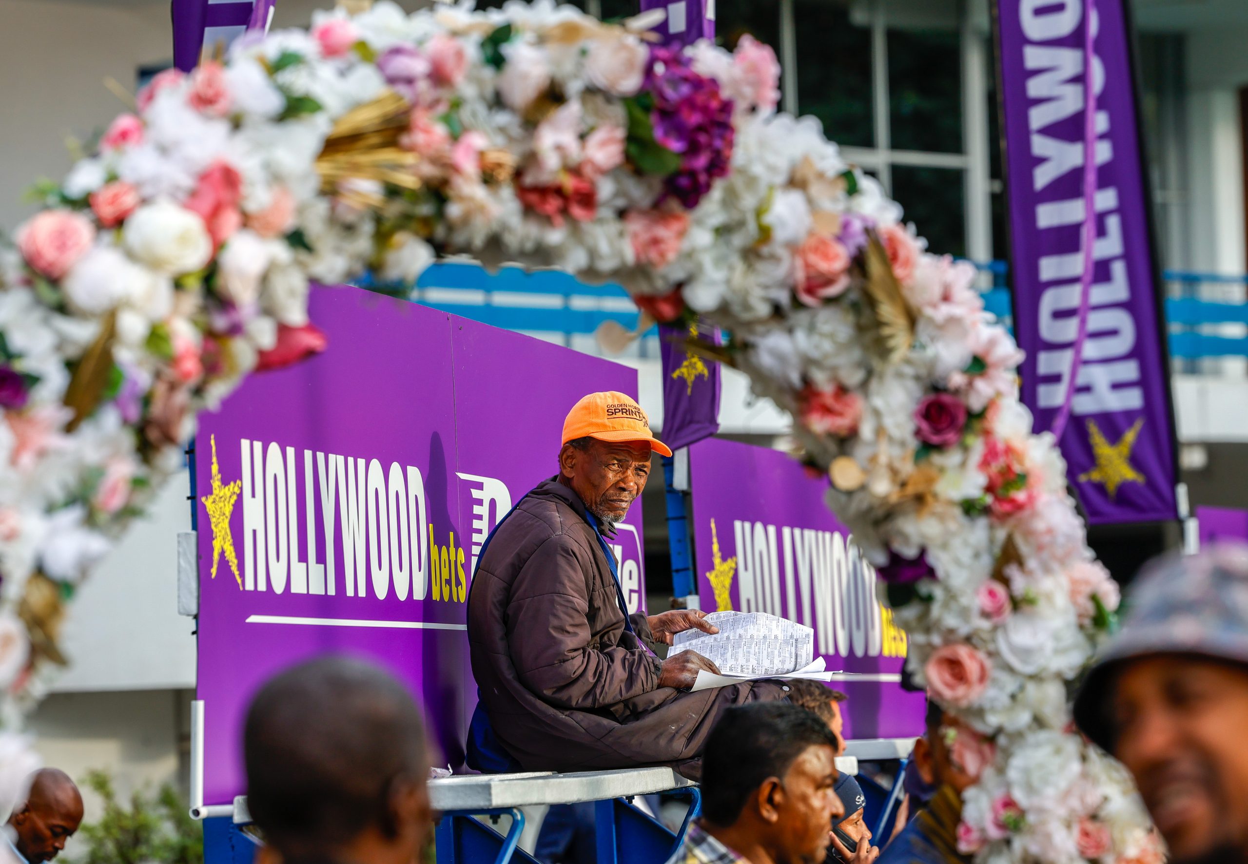 Flashback to 2024. A punter ponders in peace, amid the party and buzz on course (Pic - Candiese Lenferna)